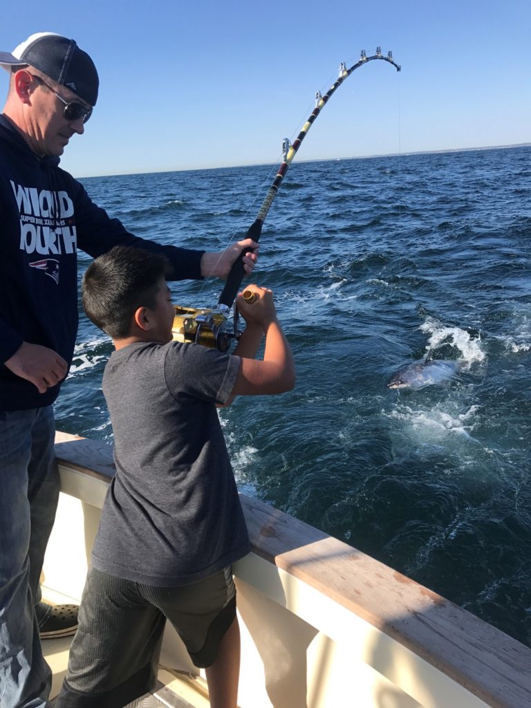 Father and Son Tuna Fishing on Tuna Hunter